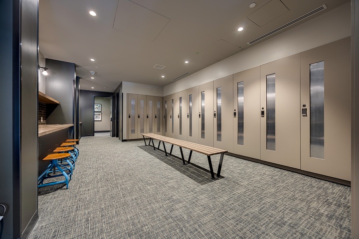 Secure your gear in dedicated lockers and prep for the day with bench seating in this well-lit storage area designed with convenience in mind.