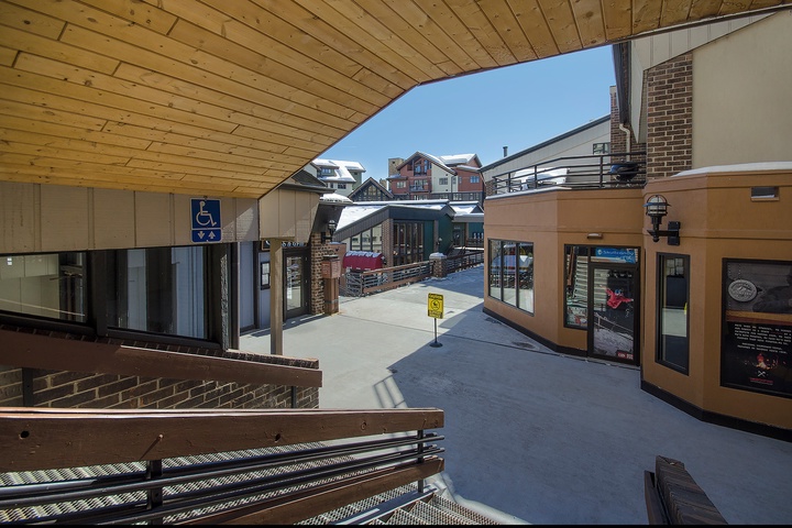 The property is part of a ski village community featuring alpine-style architecture, shared pathways, and convenient access to local shops and restaurants—all within walking distance of your accommodation.