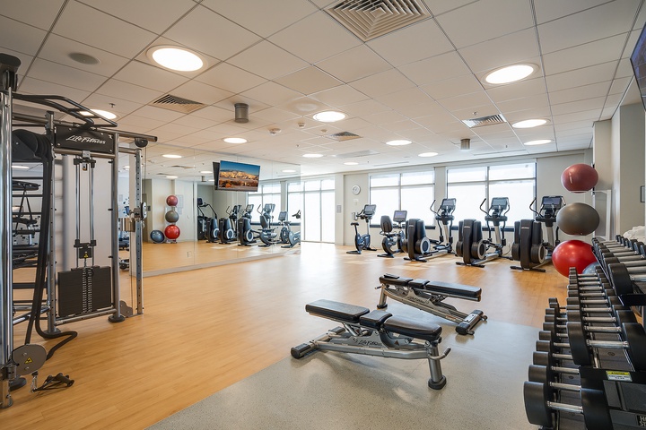 Stay energized in this bright, well-equipped fitness center with cardio machines, free weights, and strength training equipment—your workout routine doesn't skip a beat here.