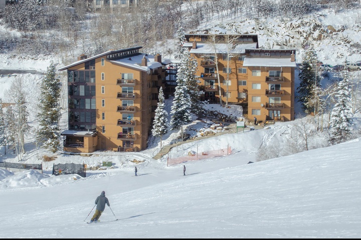 Ski-in/ski-out convenience at its finest—your mountain getaway awaits at the base of pristine slopes, surrounded by snow-dusted pines and alpine beauty.