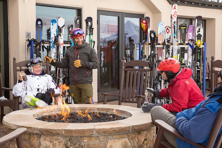 Gather around the outdoor fireplace after an exhilarating day on the slopes, sharing stories and warming up with your group in a cozy ski-in setting.