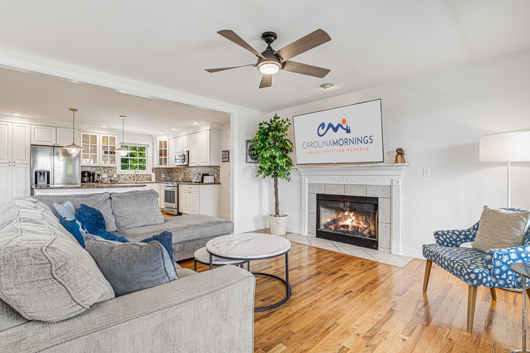 Living Area w/ Gas Fireplace & Smart TV