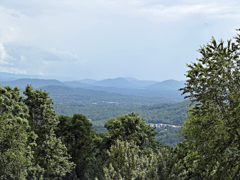 Perfectly Located With Beautiful Long Range & Downtown AVL Views