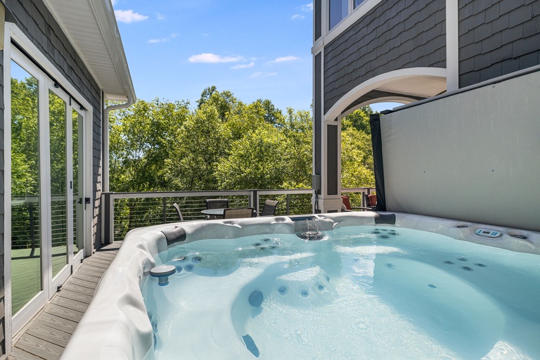 Enjoy A Soak In the Hot Tub Accompanied By Mountain Views