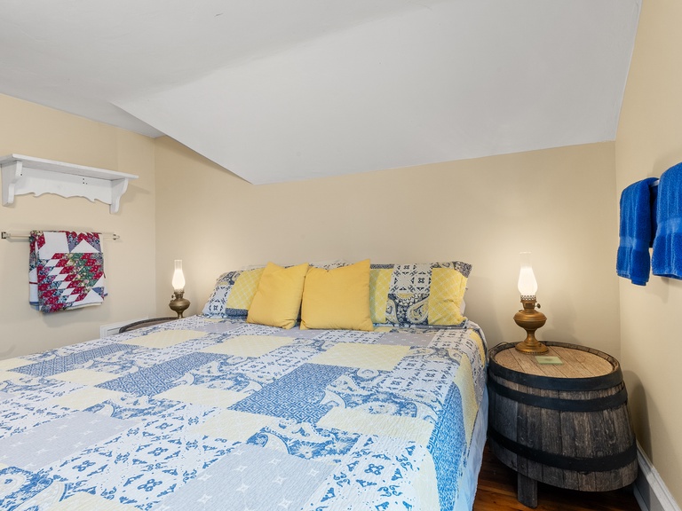 Bedroom 1: King size bed and fan