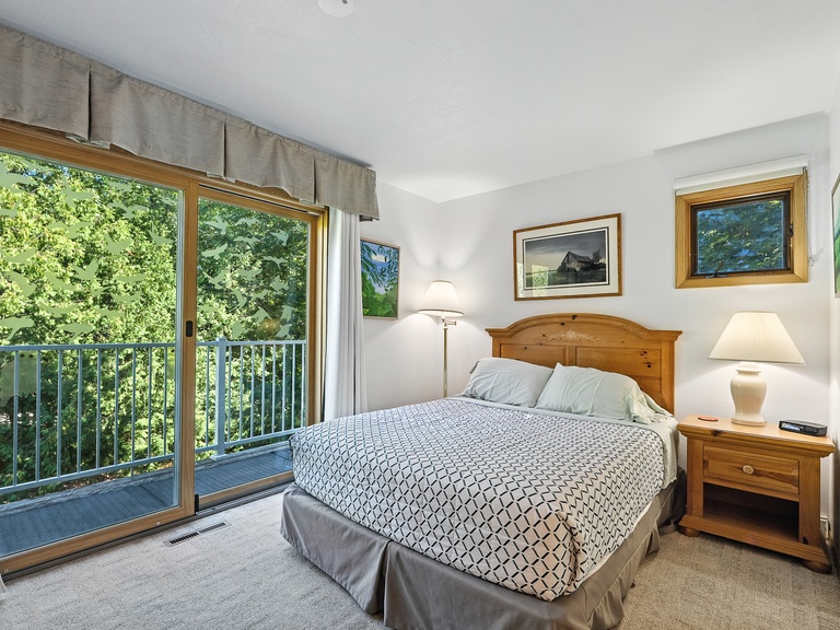 Primary Bedroom with TV and Sink in room!