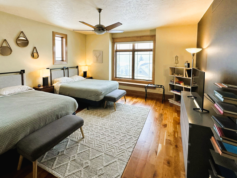 Drift off in your comfortable queen beds with crisp linens Bedroom #2 (upper level) includes 2 queen beds, TV and ceiling fan