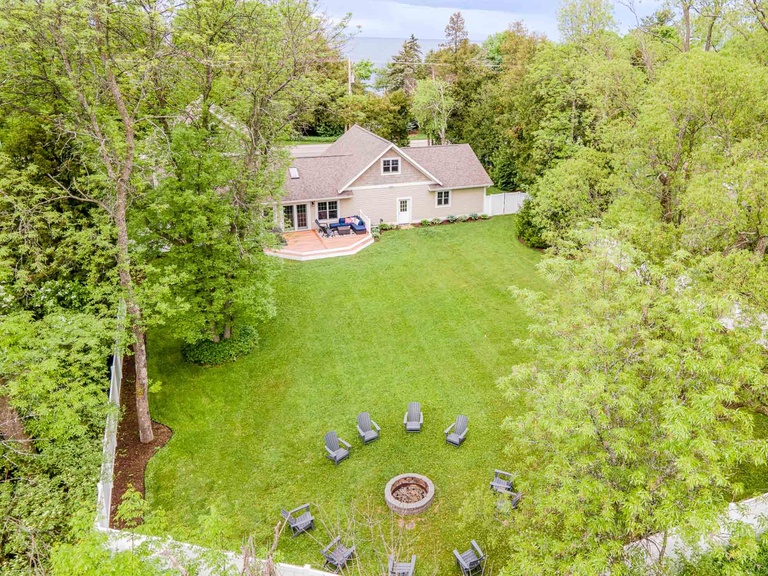 Lots of seating to enjoy the fire pit and a fenced in yard!
