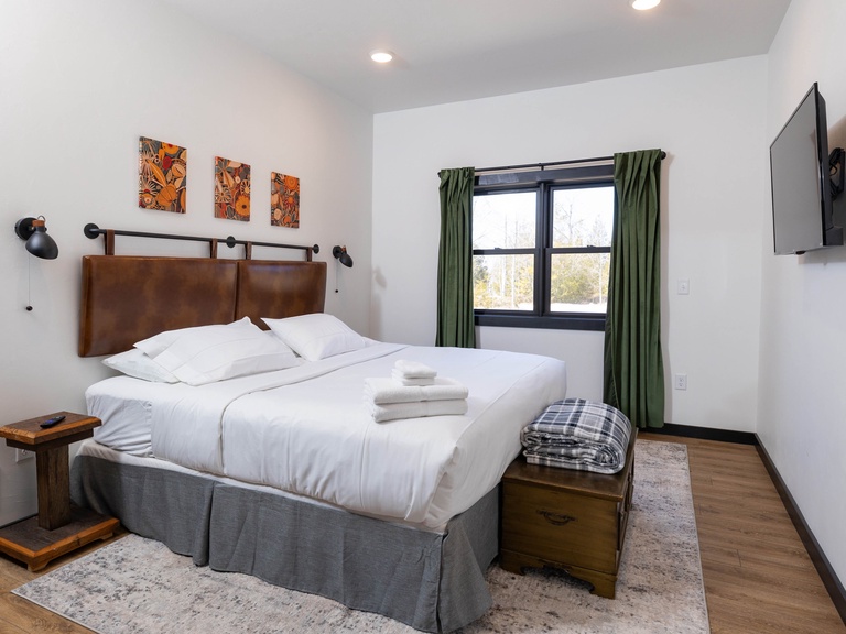 Bedroom 1 (main level): King size bed, Smart TV