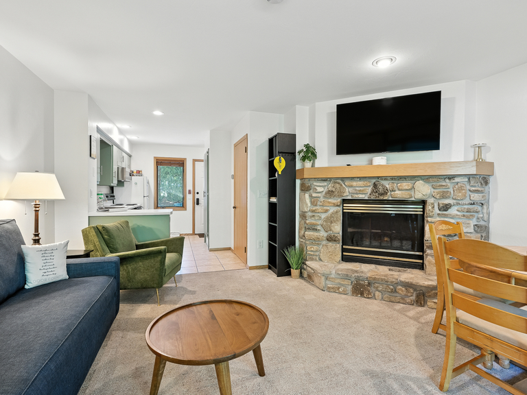 fireplace and dining table with seating for 4