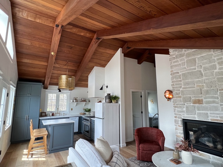 Vaulted ceiling in the open concept living space is stunning