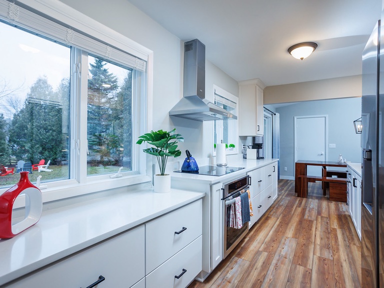 Gorgeous kitchen includes plenty of counter space and is fully stocked!