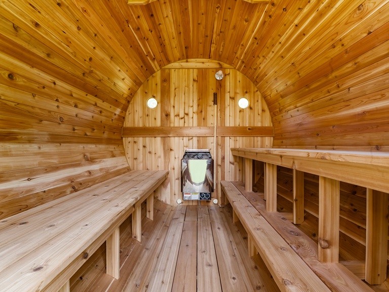 Cedar barrel sauna with electric heater and double benches