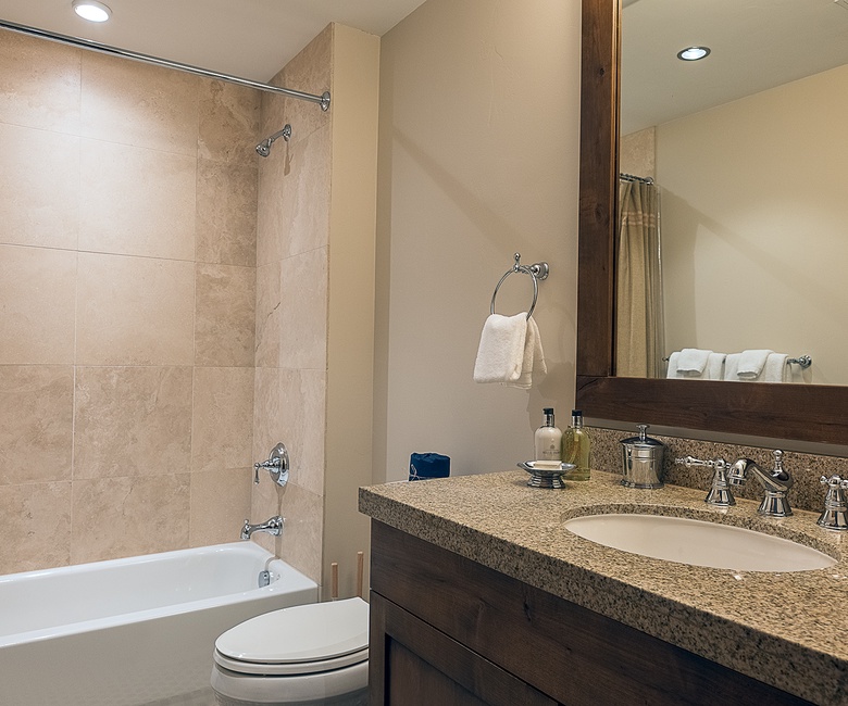 Bedroom 4, Main Level - Ensuite with single vanity and shower/tub combo