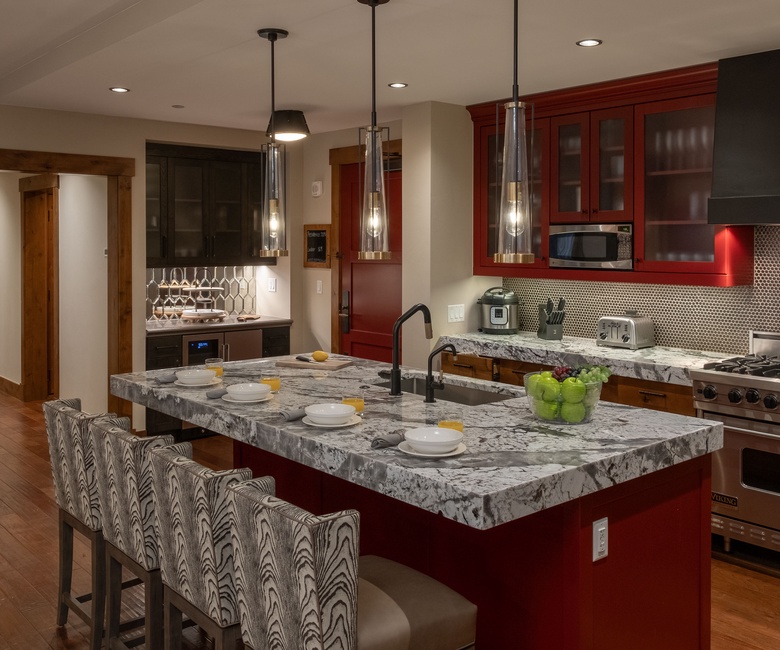 Kitchen, Main Level - With large island and red cabinetry