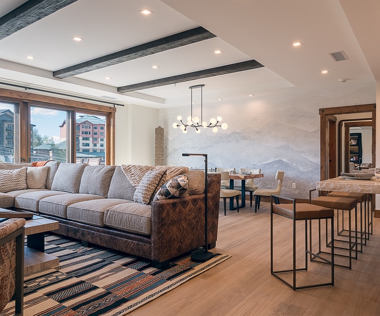 Great Room, Main Level - Seating area beside dining area with mountain views