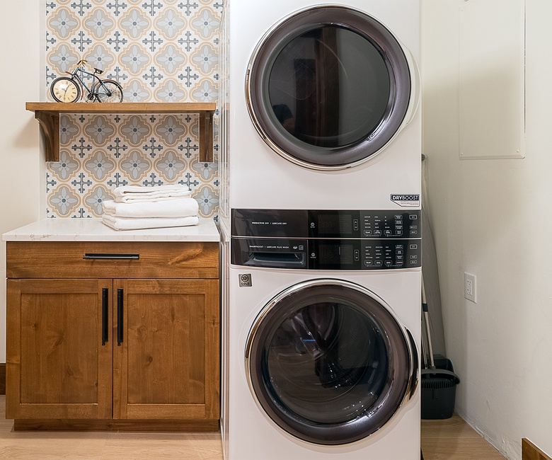 Laundry, Main Level - Stacked washer and dryer