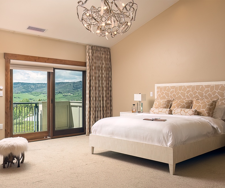 Bedroom 1, Main Level - Primary king suite with fireplace and TV
