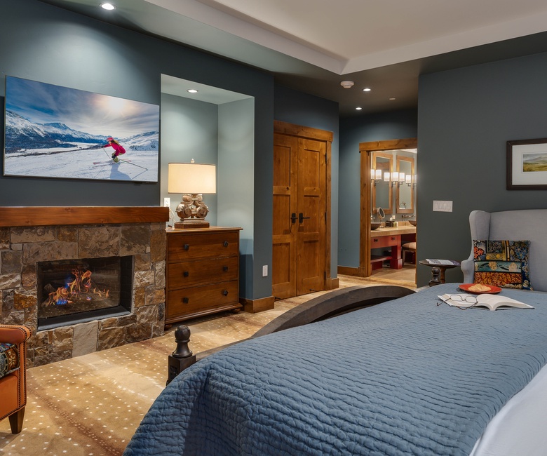 Bedroom 1, Main Level - Primary king suite with TV and fireplace