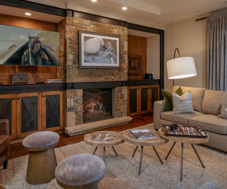 Great Room, Main Level - Fireplace with TV and deck access