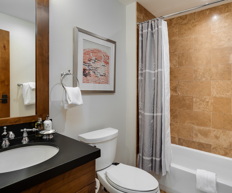 Shared Bathroom, Main Level - Hall bathroom adjacent to Bedroom 3