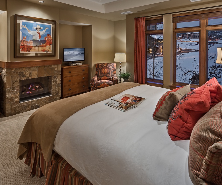 Bedroom 1, Main Level - Primary king suite with fireplace and TV
