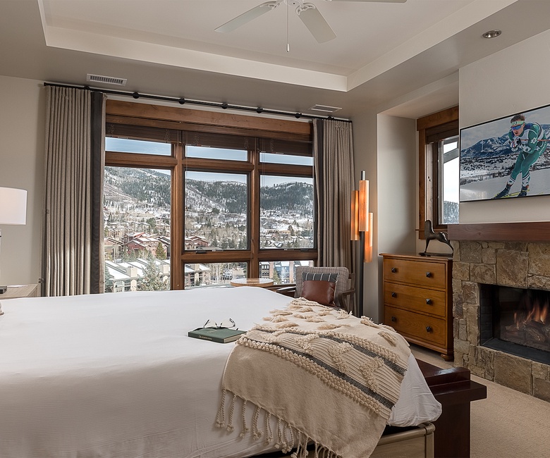 Bedroom 1, Main Level - Primary king bedroom with fireplace