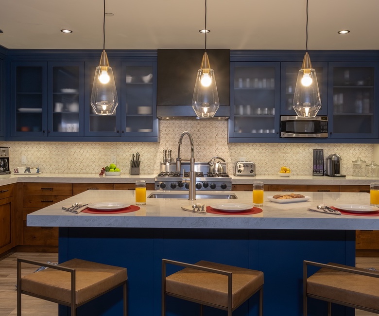 Kitchen, Main Level - Blue cabinetry with large island and pendant lighting