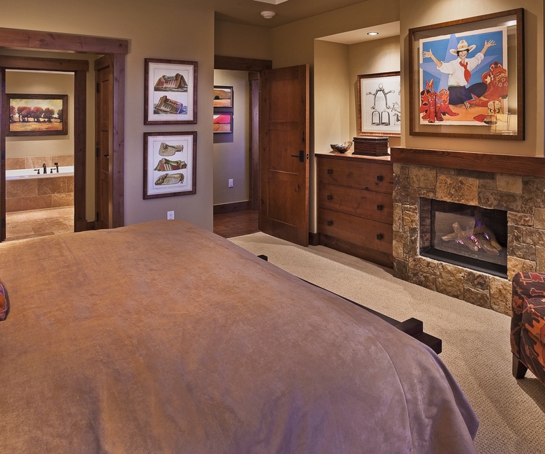 Bedroom 1, Main Level - Primary king suite with private fireplace
