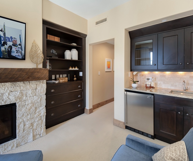 Bedroom 1, Main Level - Primary suite with fireplace and mini bar