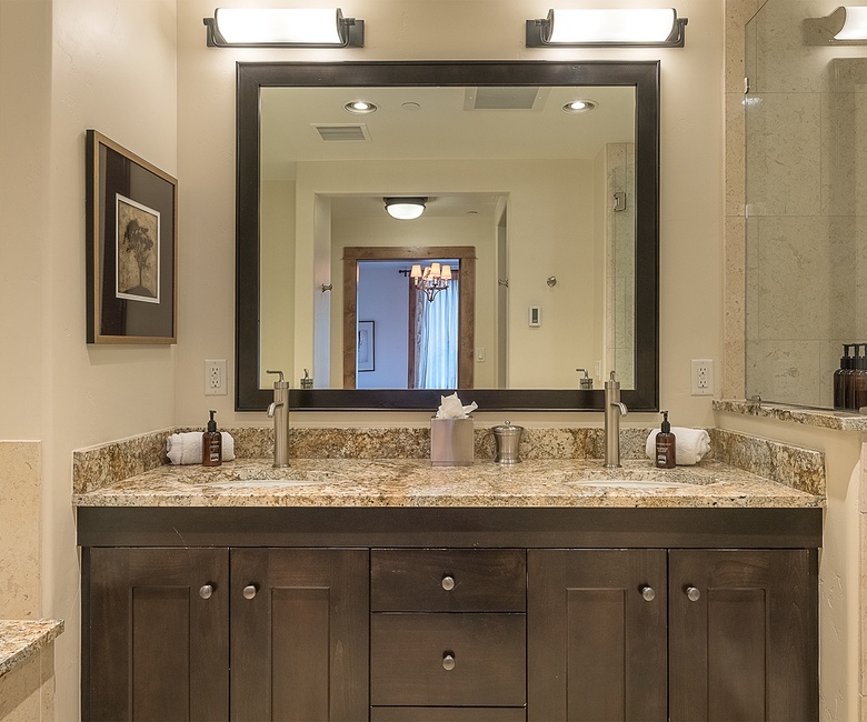 Bedroom 1, Main Level - Primary king ensuite with double vanity and walk-in shower