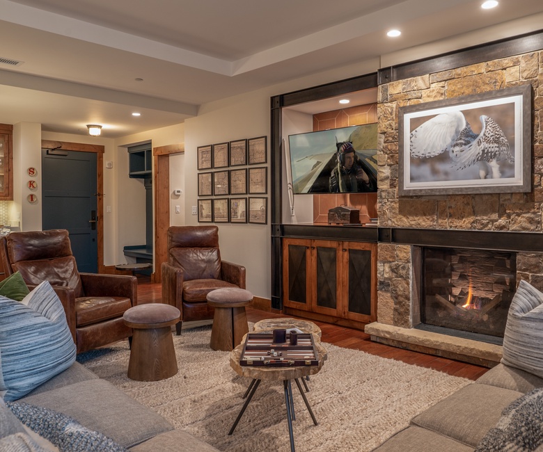 Great Room, Main Level - Fireplace with TV and seating area