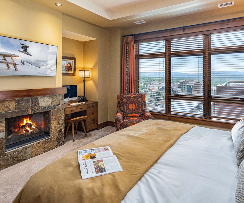 Bedroom 1, Main Level - Primary king suite with fireplace