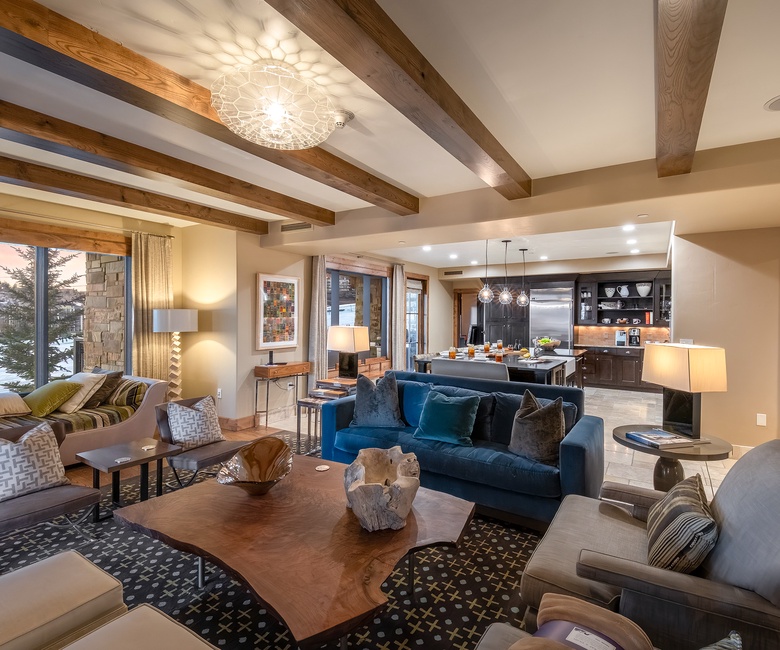 Great Room, Main Level - Open living space with fireplace, seating, and kitchen access