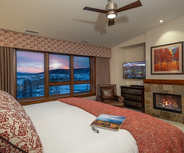 Bedroom 1, Main Level - Primary suite with fireplace