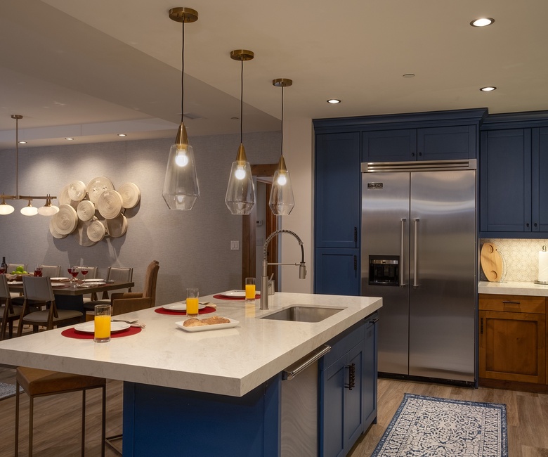 Kitchen, Main Level - Island seating with stainless steel appliances and open layout