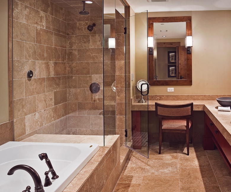 Bedroom 1, Main Level - Primary ensuite with soaking tub and walk-in shower