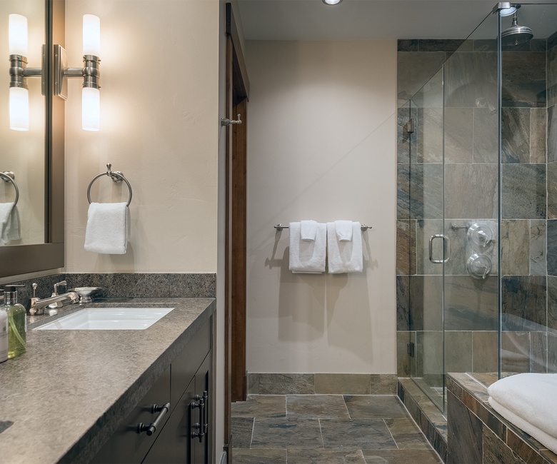 Bedroom 2, Main Level - Ensuite with single vanity and walk-in shower