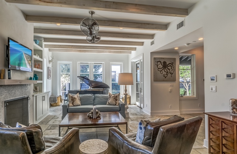 Living Room - Featuring Ample Seating & a Baby Grand Piano!