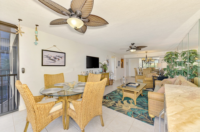 Relax in your beautifully appointed living space, complete with tropical wicker furnishings and stylish ceiling fans for comfort.