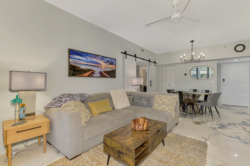 Sink into plush comfort in your stylish living space, complete with modern furnishings and a cozy atmosphere perfect for relaxing.