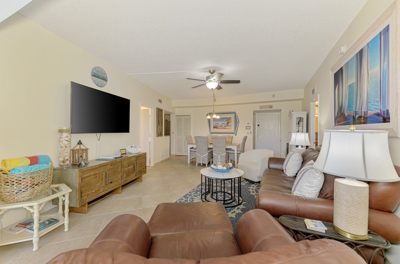Sink into plush leather seating while enjoying your favorite shows on the large TV in this bright, open living space.