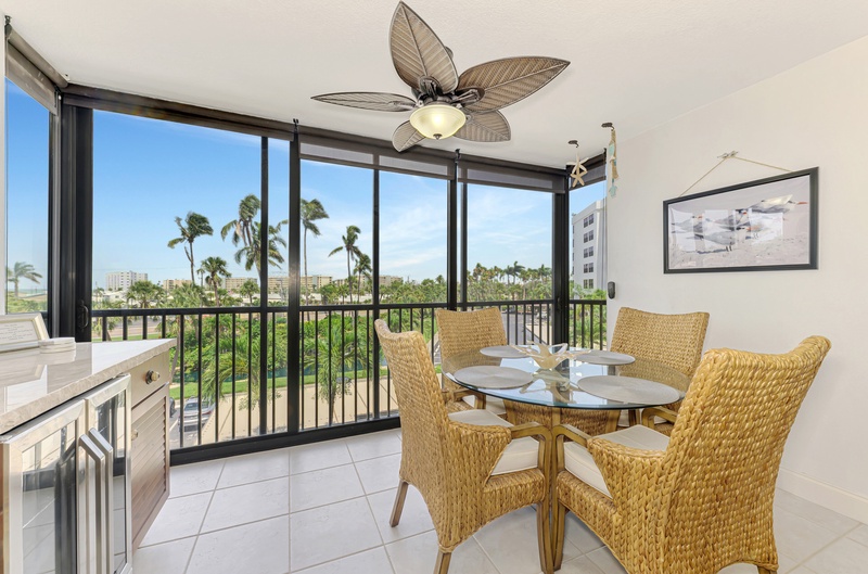 Enjoy tropical dining with stunning palm tree views from your private lanai, complete with cooling ceiling fan.