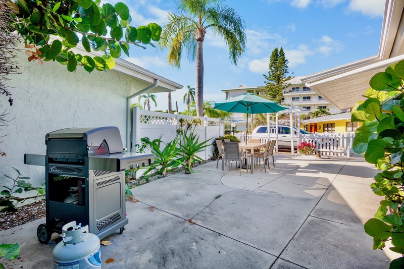 Shared Patio with Grill and Outdoor Dining Table