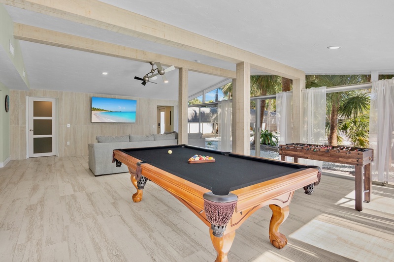 Challenge friends to pool or foosball