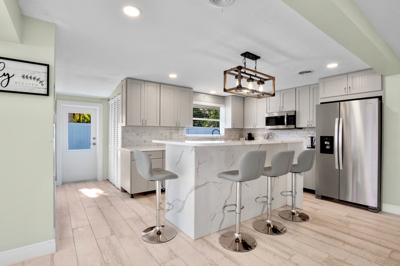Kitchen with high top seating at breakfast bar