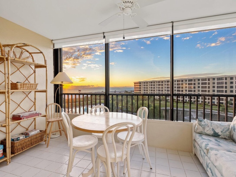 Savor your morning coffee on this sunny balcony while watching spectacular sunrises paint the sky golden over the cityscape.