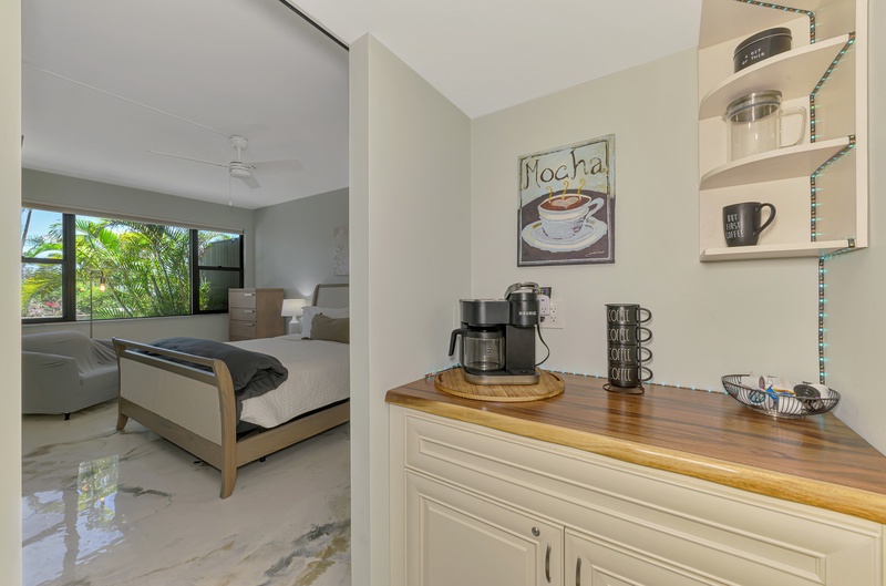 Wake up to your personal coffee station with everything ready for that perfect morning brew, steps from your comfortable bedroom.