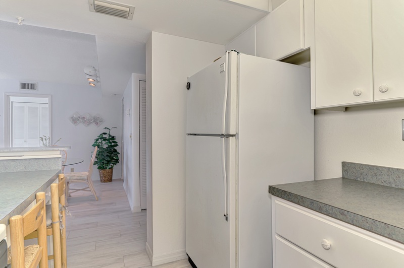 Your fully equipped kitchen offers ample storage and modern appliances, perfect for preparing home-cooked meals during your stay.