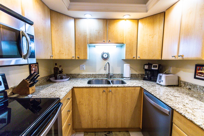 Your fully equipped kitchen awaits with granite counters, modern appliances, and everything needed to prepare meals during your stay.